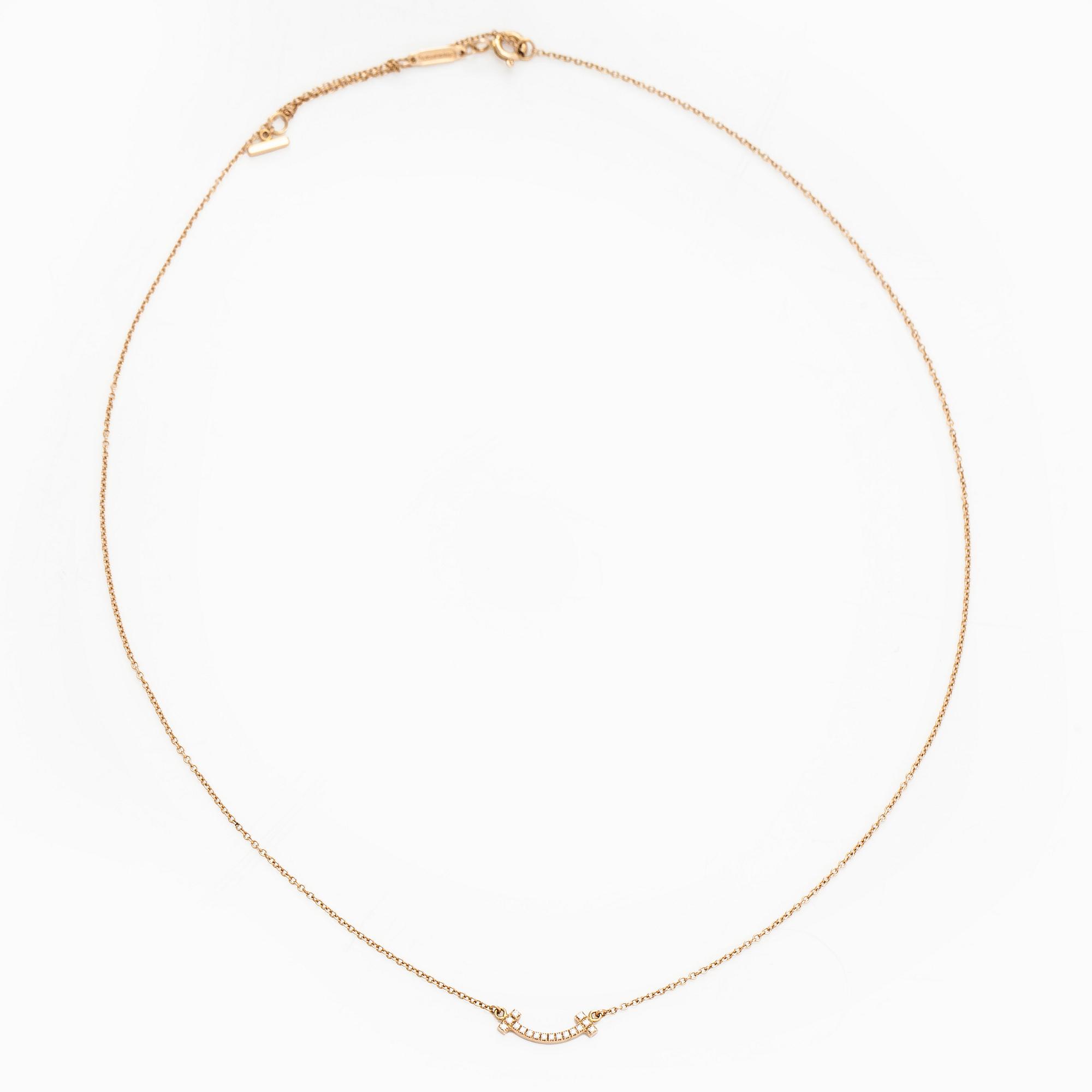 Tiffany & Co, kaulakoru, "T Smile", 18K kultaa ja briljanttihiottuja timantteja.