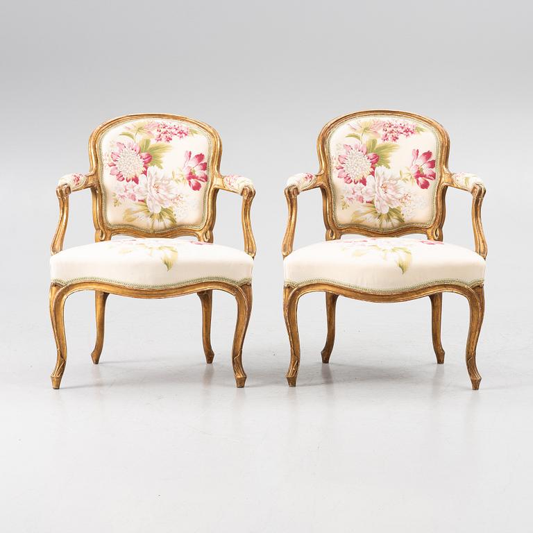 A pair of presumably French Louis XV armchairs, mid 18th century.