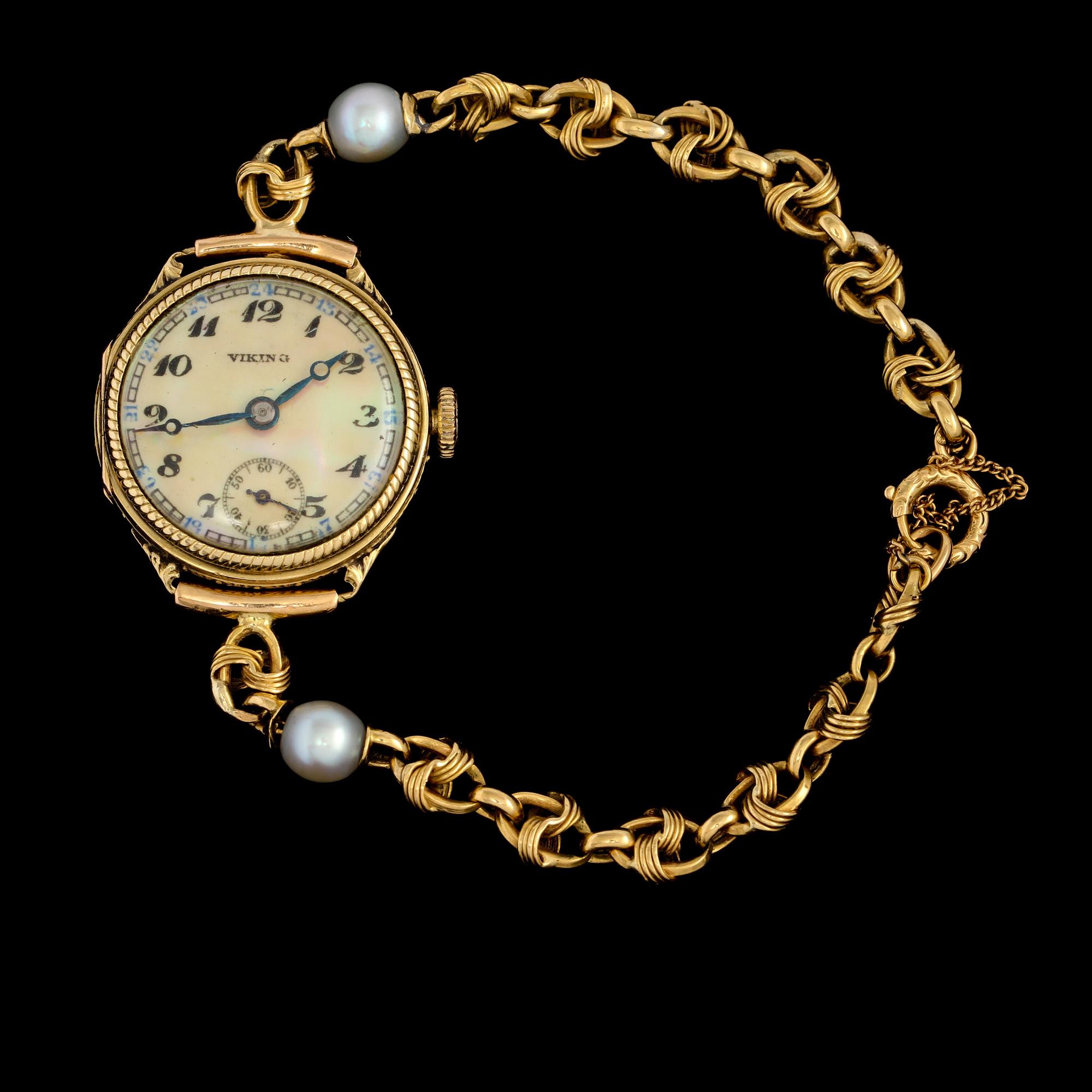 ARMBANDSUR, 14k guld, Viking med importstämplad armlänk i 18k guld samt 2 odlade pärlor. Vikt 19,6 g.