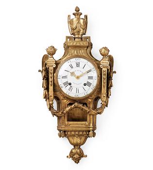 1339. A Louis XVI late 18th century gilt bronze wall clock.