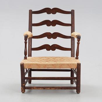 A Swedish Royal "Gripsholm" armchair.