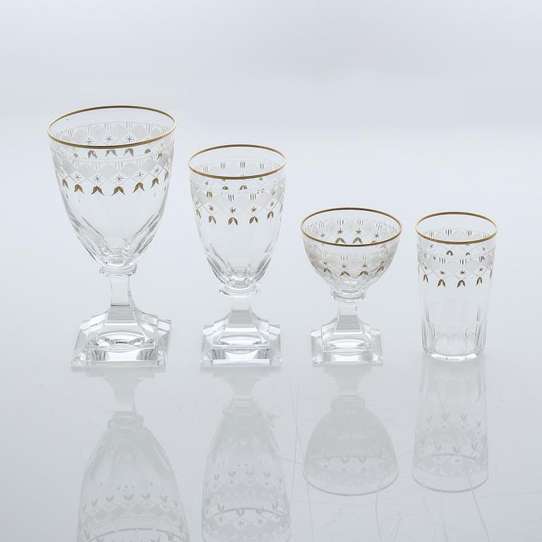 A glass tableware set of 38 pcs, "Odelberg Junior" by Kosta, second quarter of the 20th century.