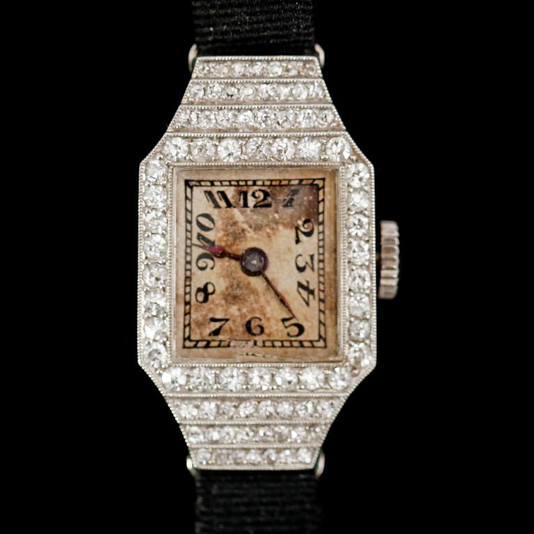 DAMARMBANDSUR, 18 k guld, diamanter tot ca 0.60 ct, 1920-/30-tal.