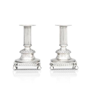 180. A pair of Swedish 18th century silver candlesticks, mark of Mikael Nyberg, Stockholm 1796.