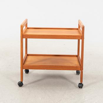 A teak serving trolley from the middle of the 20th century.