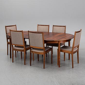 A seven-piece rosewood dining suite, 1960's/70's.