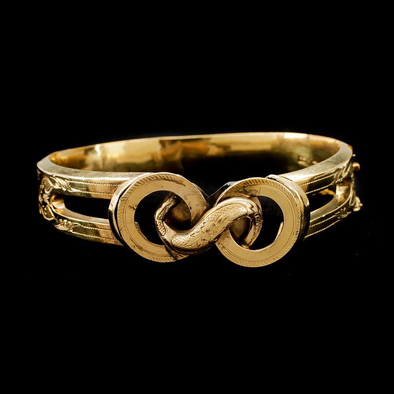 ARMRING, 18k guld. Helsingfors, 1861. Vikt ca 19g.