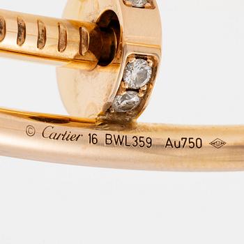A Cartier bracelet "Juste un clou" in 18K rose gold with round brilliant-cut diamonds.
