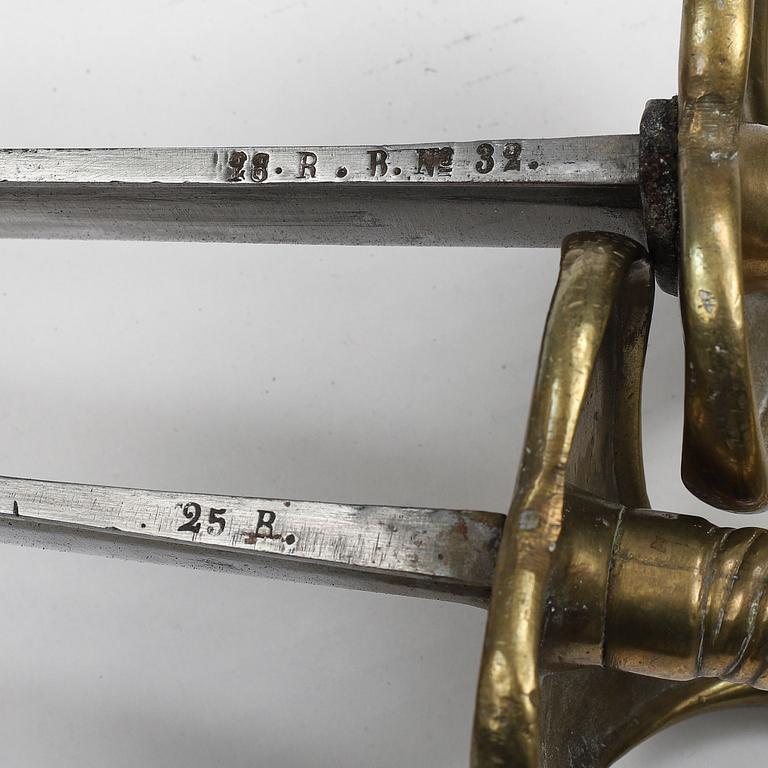 Two Swedish cutlasses 1748-1856 pattern with scabbards.