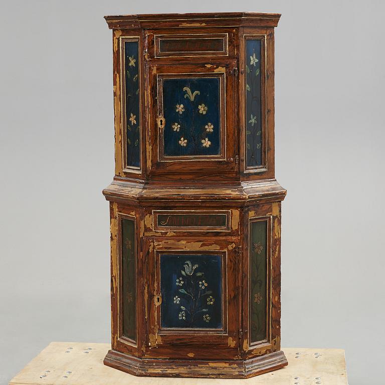 A 18th century corner cabinet.
