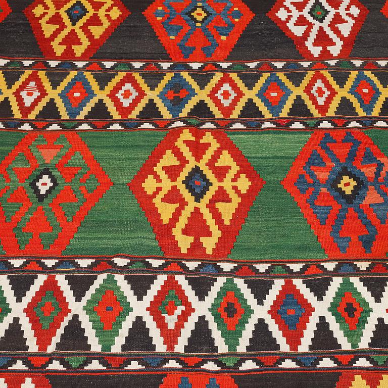 A carpet, Antique Caucasian kilim, ca 252 x 195 cm.
