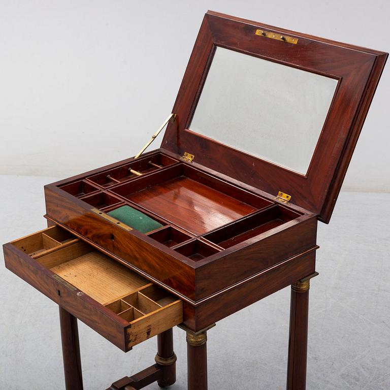 A mid 19th century sewing table.