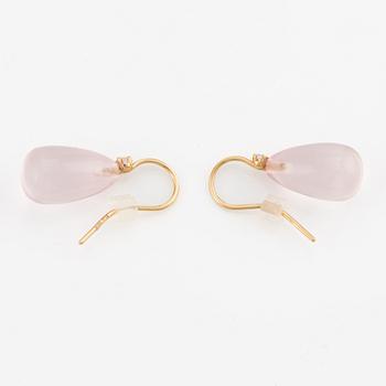 A pair of 18K gold earrings with rose quartz and round brilliant-cut diamonds.