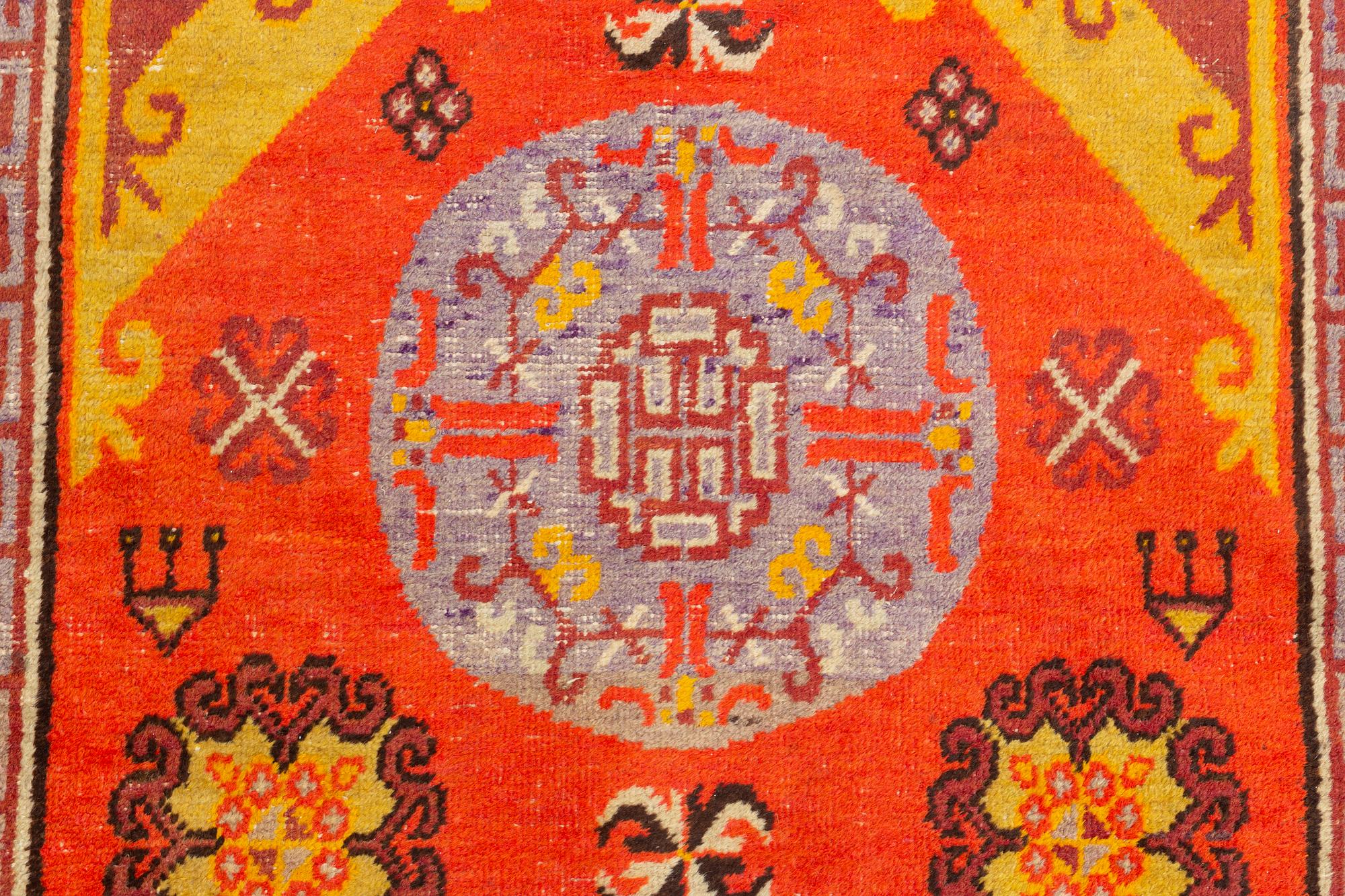 A Carpet, Khotan (?), 217 x 108 cm.
