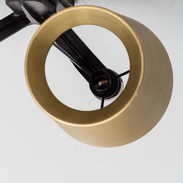 TOM DIXON, a pair of 'Base' wall light.