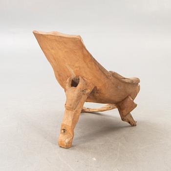 A late 20th century wooden armchair.