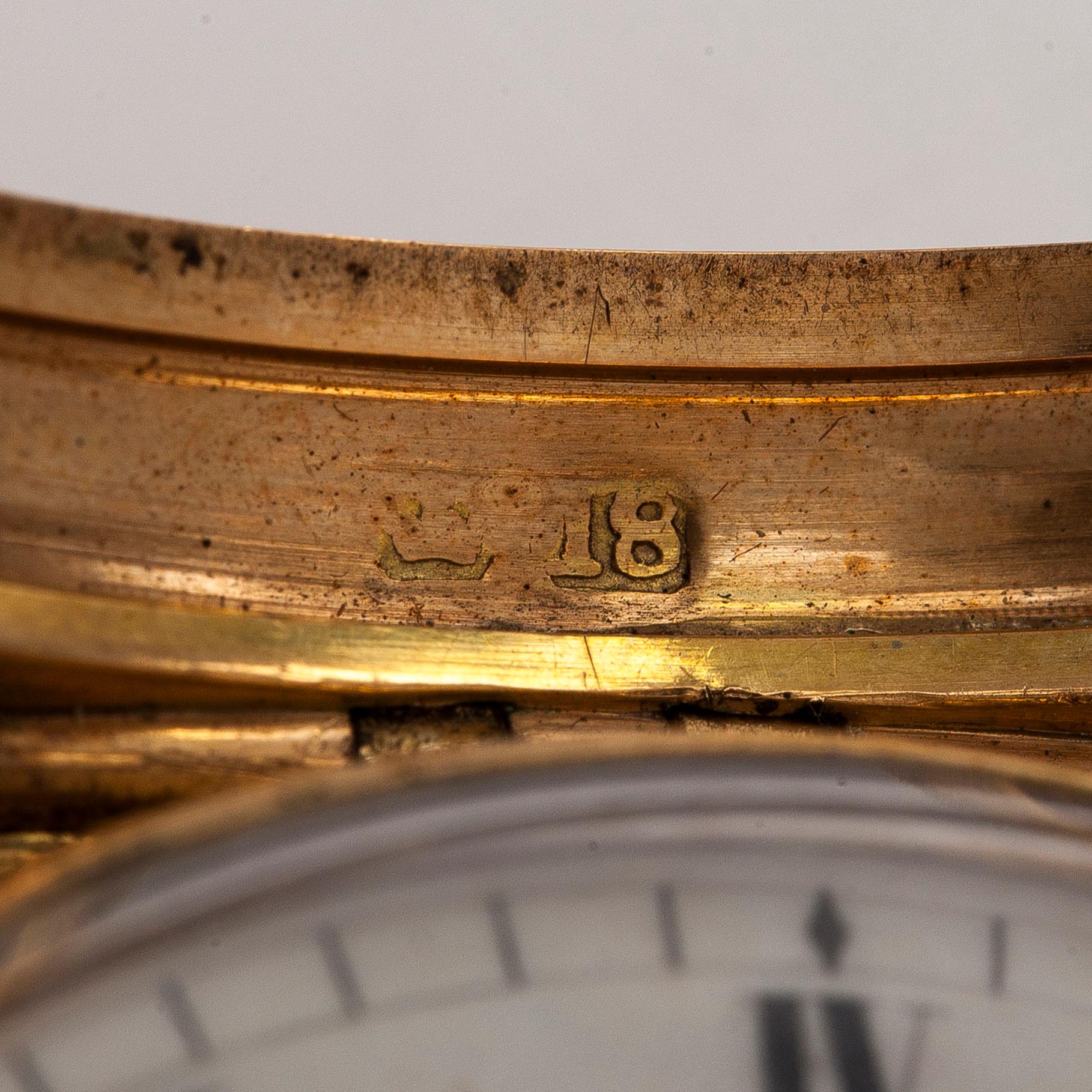 Taskukello, 52 mm, 18K kultaa, John Moncas, Liverpool, 1800-luvun ensimmäinen puolisko.