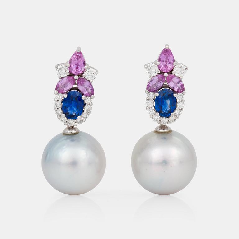 A pair of cultured South Sea pearl, sapphire and diamond earrings.