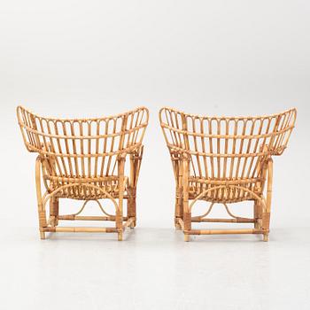 A pair of rattan easy chairs, possibly Viggo Boesen.