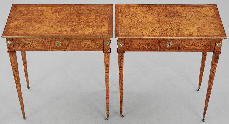 A pair of Gustavian tables signed by A. Lundelius and dated 1785.