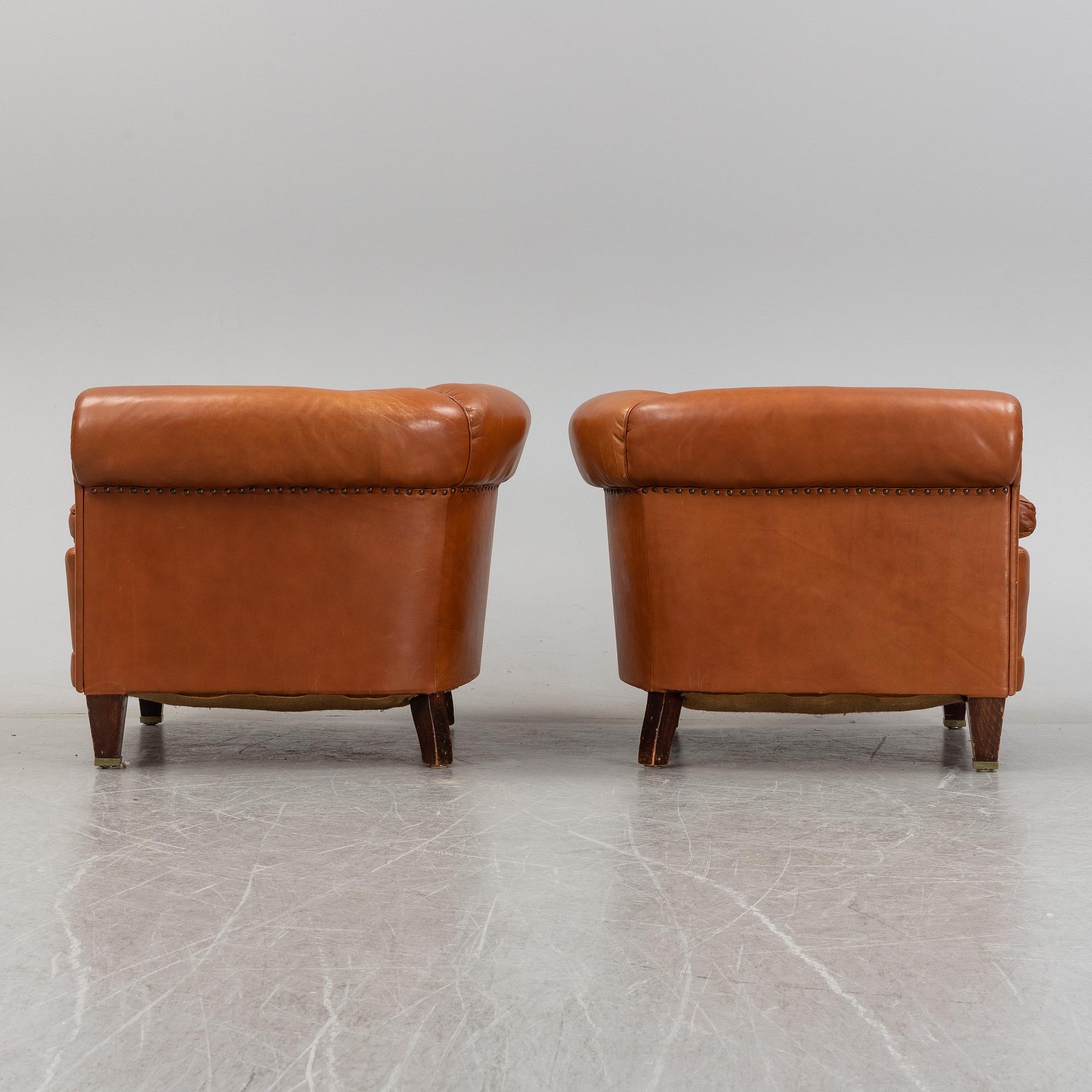 A pair of leather upholstered club chairs, 1930/40's.