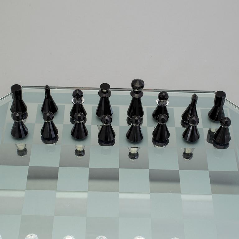 A SWAROVSKI CHESS SET.