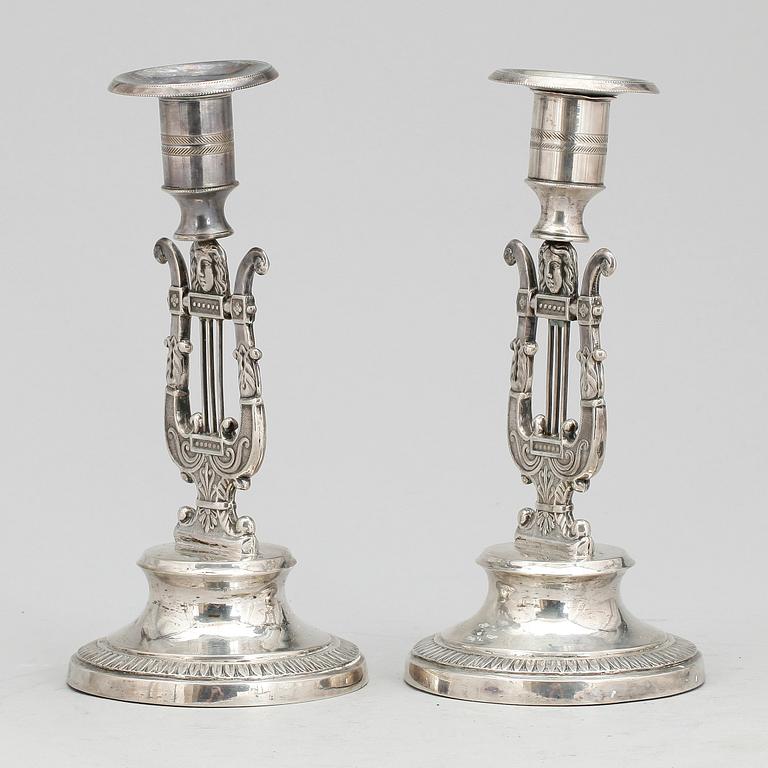 LJUSSTAKAR, ett par, silver, Petter Adolf Sjöberg, Stockholm 1828. Empire.