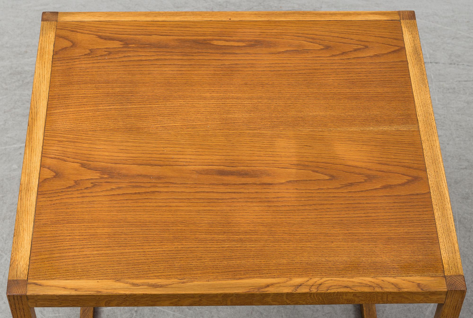 MARIO PRANDINA, an oak table and four chairs, Plinio Il Giovane, Italy.
