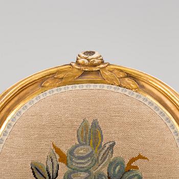 A Gustavian style arm chair, first half ot the 20th Century.