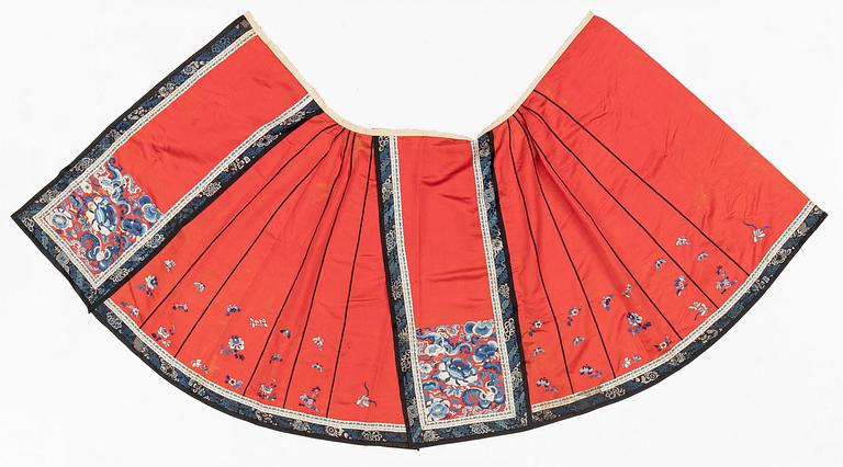 Two embroidered silk skirts, late Qing dynasty.