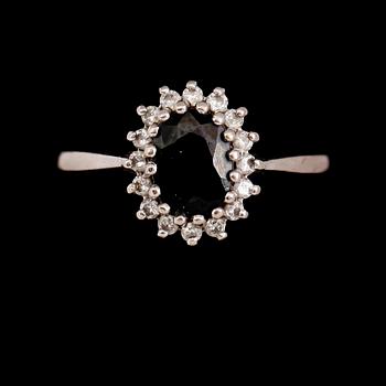 RING, 14 k vitguld, blå safir ca 1.20 ct, diamanter tot ca 0.16 ct.