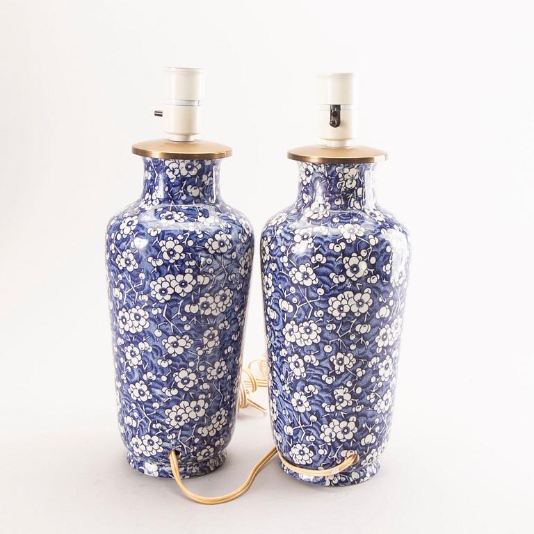 A pair of 20th century porcelain  table lamps.