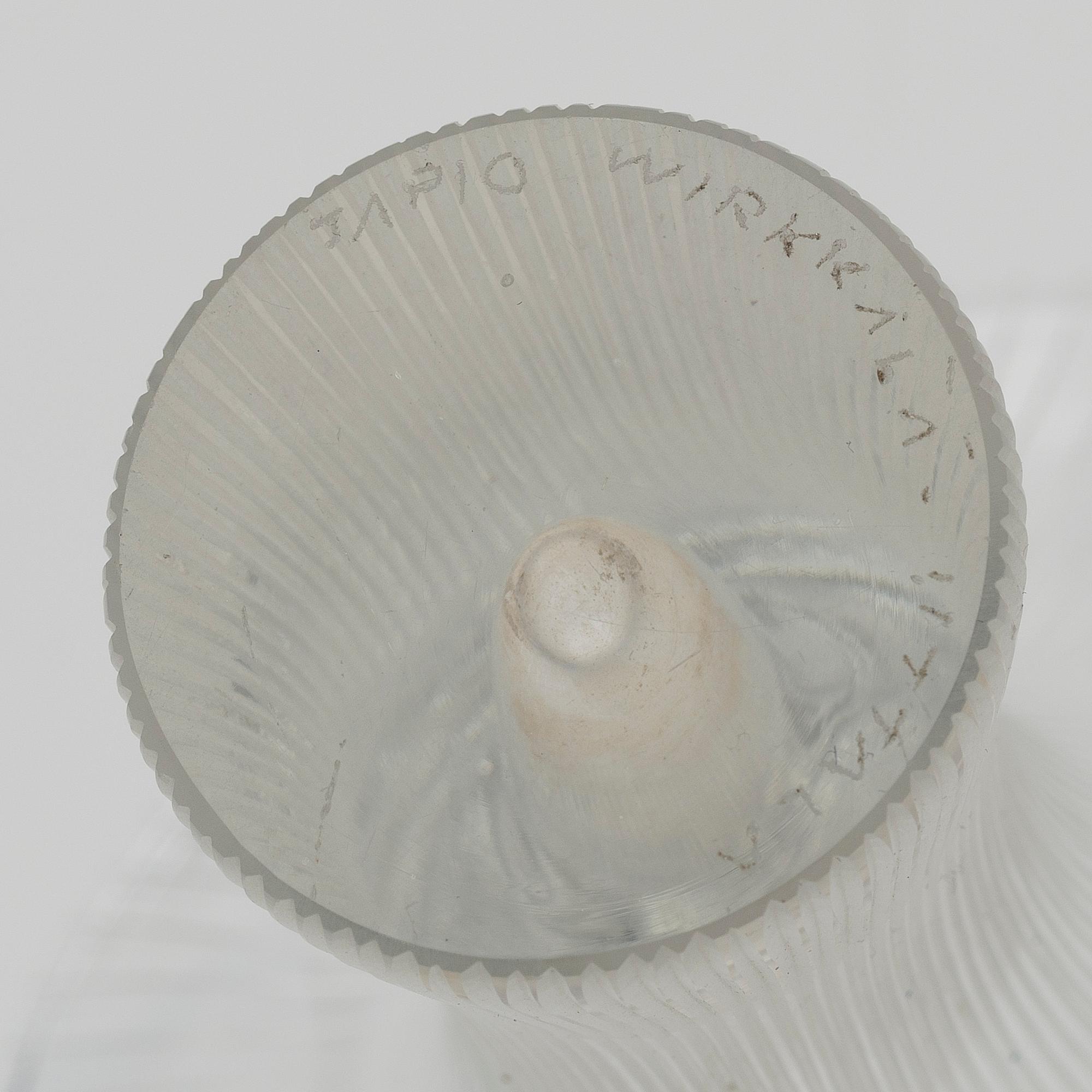 A CHANTARELLE GLASS VASE.