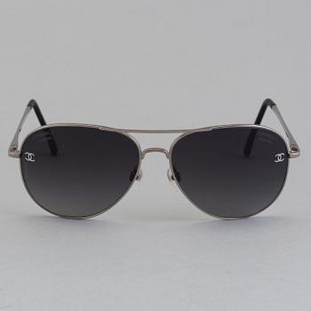 Chanel silver and black pilot summer sun glasses.