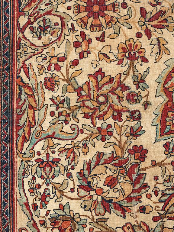A carpet, an antique Kerman Laver, ca 677-688,5 x 510,5-526 cm.