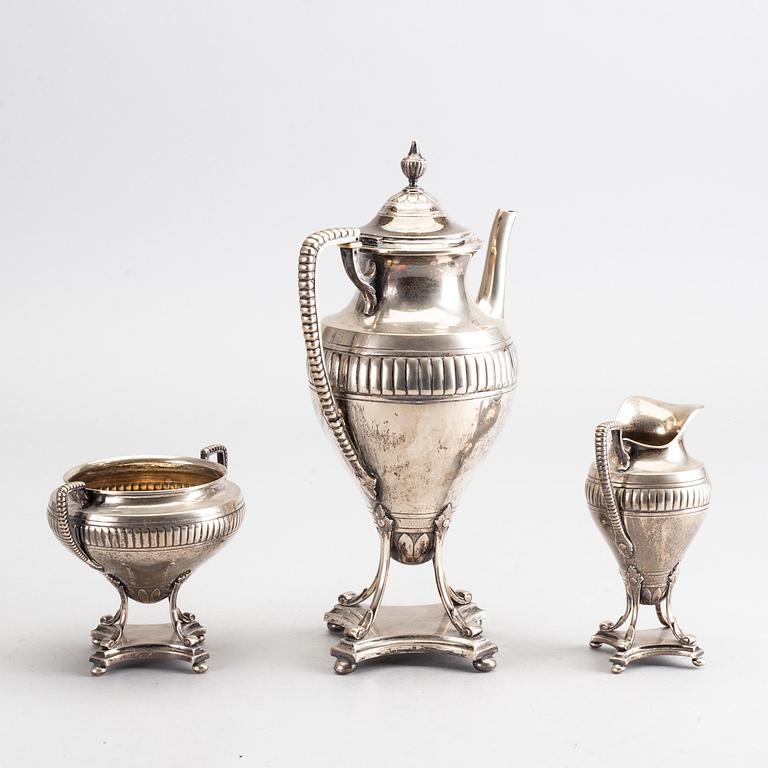 A Swedish 20th century silver three part coffee service mark of GAB Stockholm 1902 weight 1100 gr.