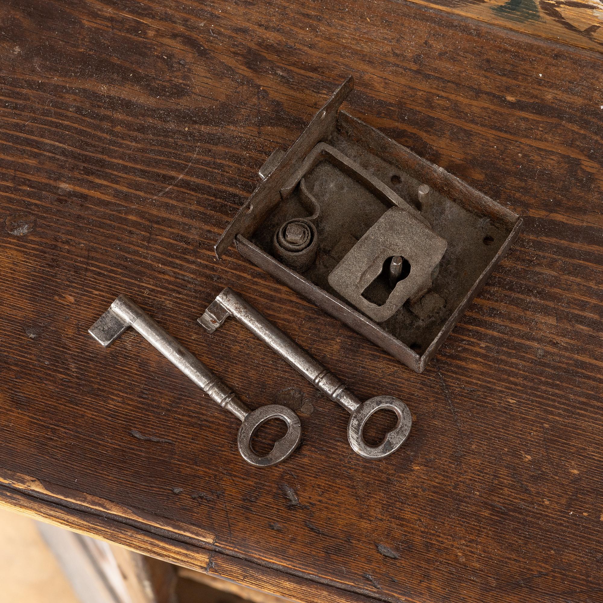 A Swedish Dalecarlian folk art cabinet dated 1808.