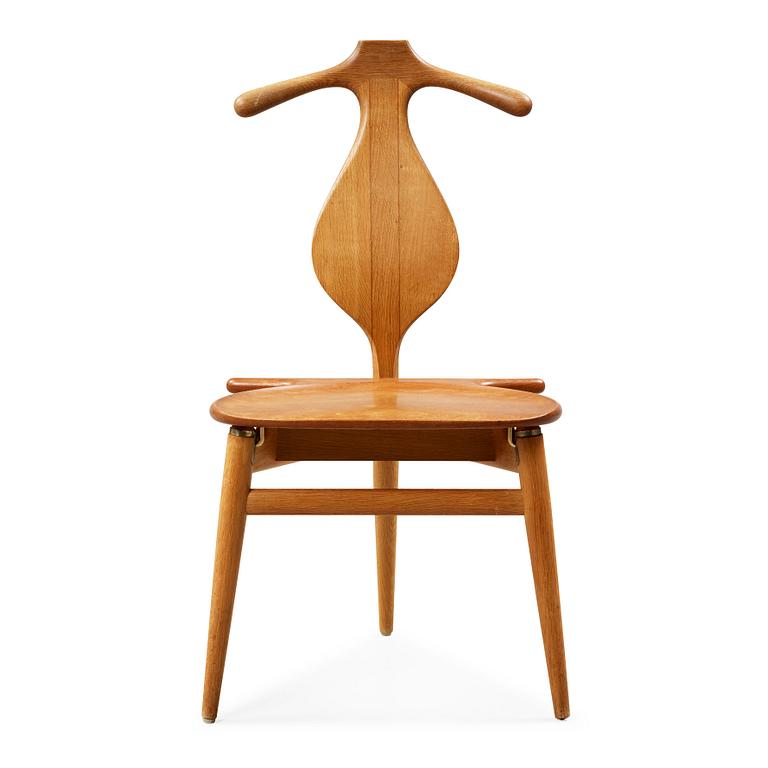 A Hans J Wegner 'Jakkens Hvile' teak chair, Johannes Hansen, Denmark.