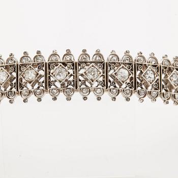 A tiara/bracelet set with old and rose cut diamonds.
