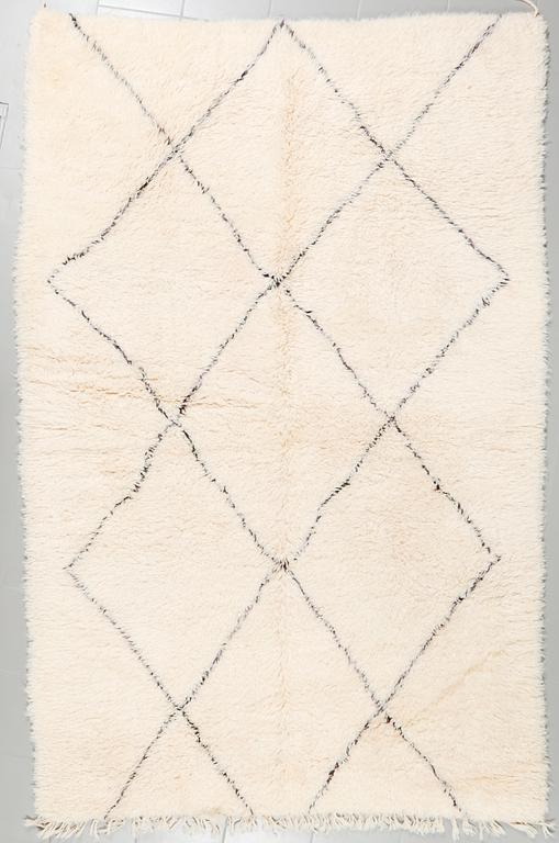 A moroccan rug, ca 280 x 180 cm.