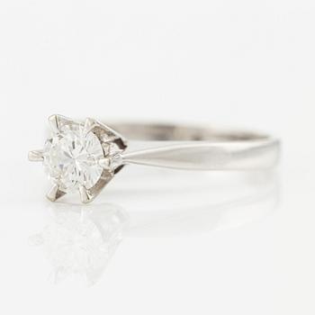 An 18K white gold ring set with a round brilliant-cut diamond 0.53 ct TW/if according to engraving.