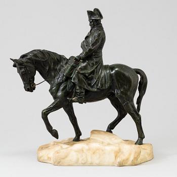 A bronze sculpture of Napoleon on horseback, 20th century mounted on a white marble inscribed "1813" and "Conille".