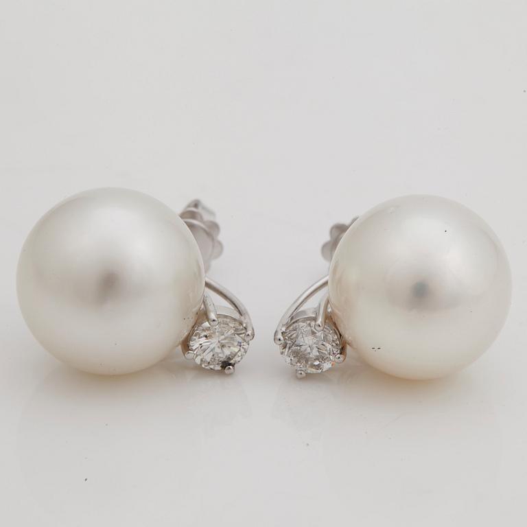 A pair of cultured South sea pearl and brilliant cut diamond earrings.