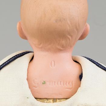 a German porcellain doll from the early 20th century.