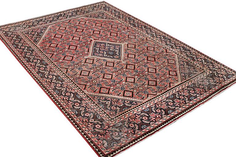 A Persian carpet, vintage design, ca. 286 x 208 cm.