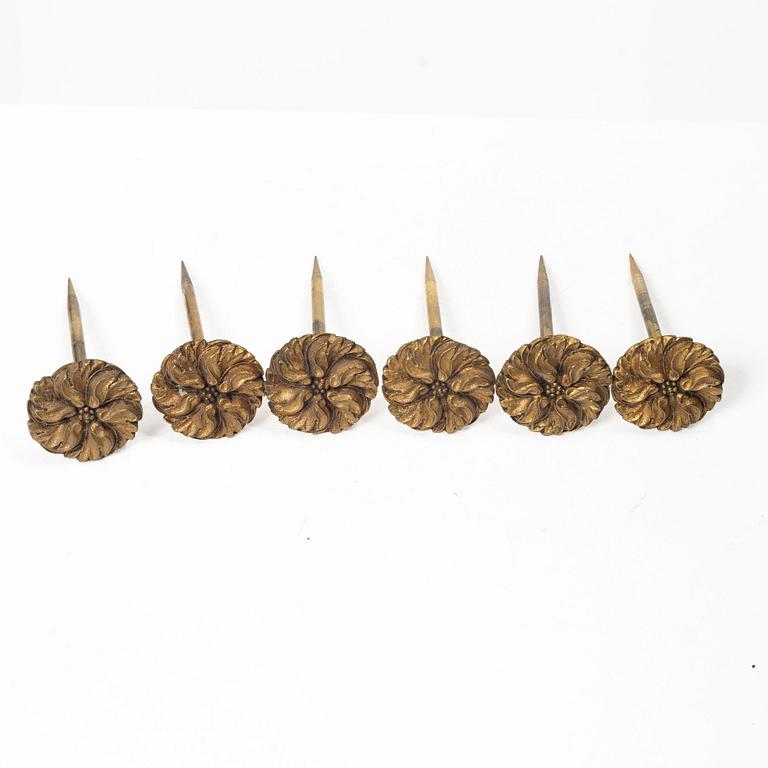 Twelve curtain tiebacks, 19th Century.