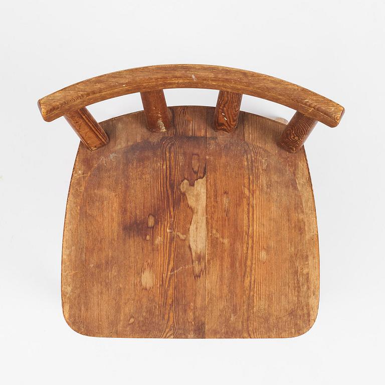 Axel Einar Hjorth, a set of seven stained pine "Utö" chairs, Nordiska Kompaniet, Sweden, 1930s.