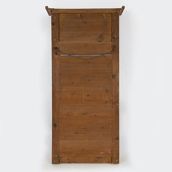 An Empire Mahogany Veneer Mirror and Console Table, first half of the 19th Century.