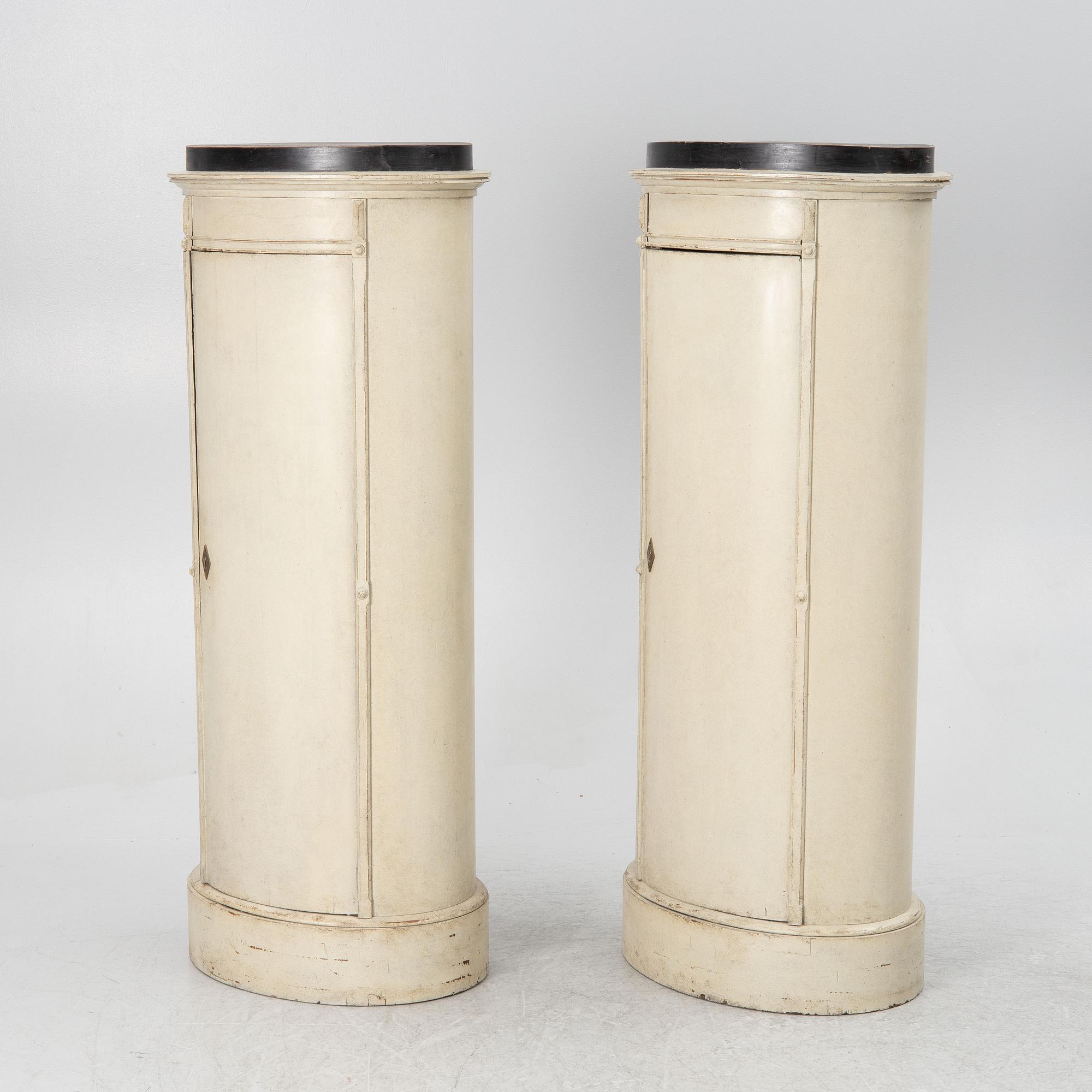 A pair of column cabinets, 19th century.