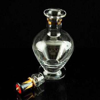 Gunnar Cyrén, a set of six "Devil" shot glasses and a decanter from the "Nobel" series, Orrefors Sweden post 1996.